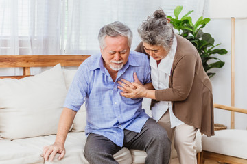 Retired Asian senior elderly husband pain from heart attack disease