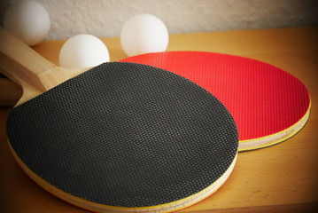 ping pong racket and ball