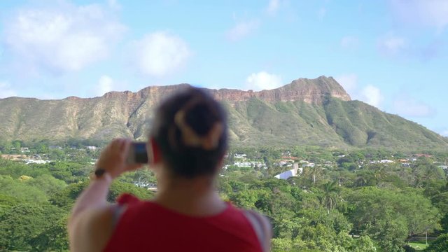 Girl Takes A photo on Honolulu Hawaii island in 4K Slow motion 60fps
