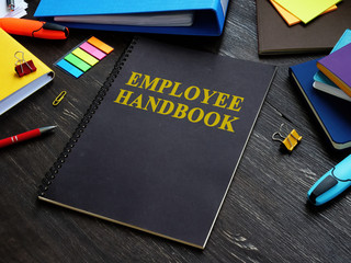 Employee handbook and papers with rules and procedures. - obrazy, fototapety, plakaty