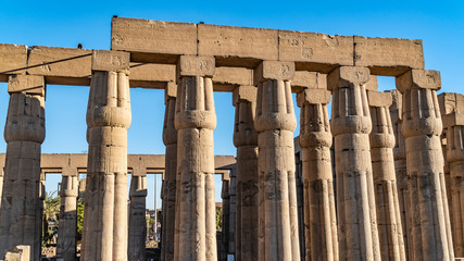 Fototapeta premium Luxor Temple in Luxor, ancient Thebes, Egypt. Luxor Temple is a large Ancient Egyptian temple complex located on the east bank of the Nile River and was constructed approximately 1400 BCE.