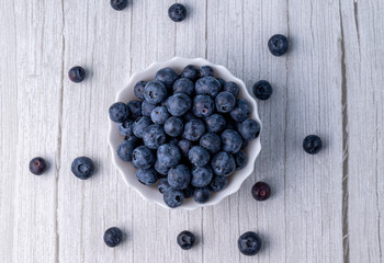 Berries, summer fruits on a wooden table. Healthy lifestyle concept.