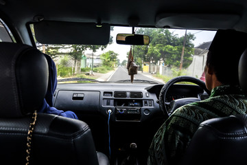 father was driving a car during Eid
