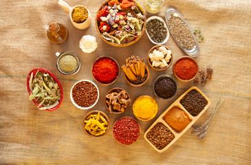 Obraz na płótnie Canvas Various spices and herbs as a background.