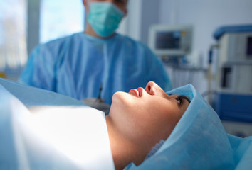 Man surgeon at work in operating room