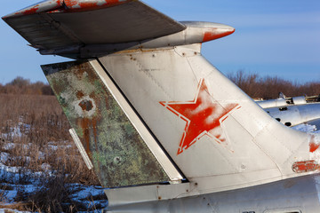 Old aircraft tail with USSR star.