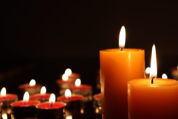 Candle black background of mourning funeral moment of silence	