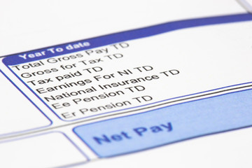 Wage pay slip showing pension, national insurance and tax earnings deductions.  Isolated on a white background