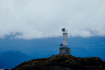 lighthouse on the coast of the sea