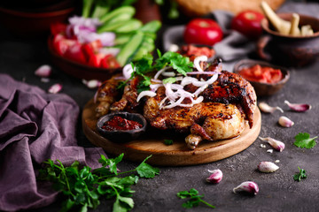 Chicken Tabaka.traditional Georgian dish .selective focus