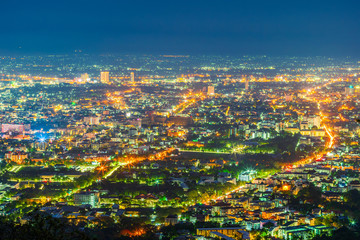 Obraz premium Beautiful of Landscape View cityscape over The color of the lights and city center of Chiang mai,Thailand at twilight night background.