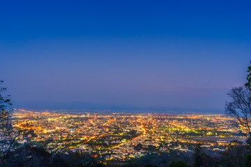 Fototapeta na wymiar Beautiful of Landscape View cityscape over The color of the lights and city center of Chiang mai,Thailand at twilight night background.