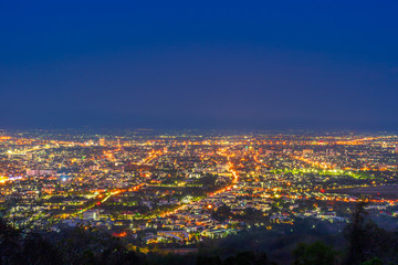 Beautiful of Landscape View cityscape over The color of the lights and city center of Chiang mai,Thailand at twilight night background.