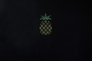 Drawing pineapple on a black board