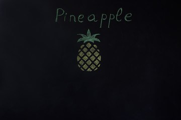 Drawing pineapple on a black board