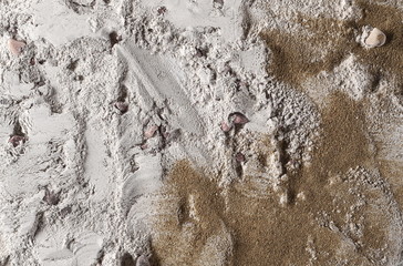 Dry cement, mortar pile, plaster with red rocks and sand surface background and texture