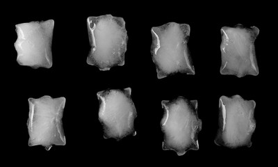 Ice cubes set and collection isolated on black background, top view