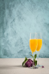 Two glasses of mimosa cocktail