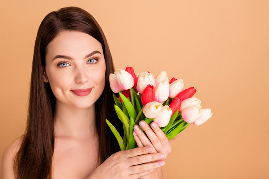 Close Up Photo Of Positive Cheerful Girl Enjoy Present For 8-march Hold Flowers Given After Colage Beauty Spa Salon Isolated Over Pastel Color Background