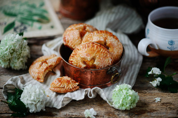 Jam filled hand pies. .Dark rustic photo