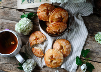 Jam filled hand pies. .Dark rustic photo