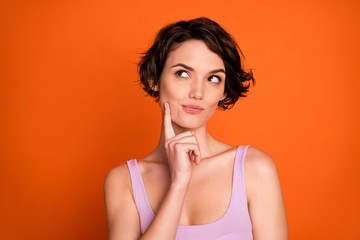 Portrait of interested girl touch chin finger look copyspace think thoughts weekend summer plans...