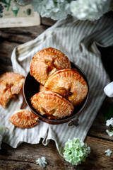 Jam filled hand pies. .Dark rustic photo