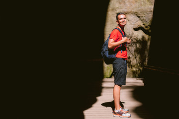 Young male hiker with backpack. Active healthy lifestyle adventure journey vacations. photo with space for your montage