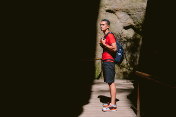 Young male hiker with backpack. Active healthy lifestyle adventure journey vacations. photo with space for your montage