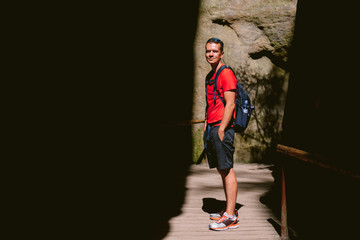 Young male hiker with backpack. Active healthy lifestyle adventure journey vacations. photo with space for your montage