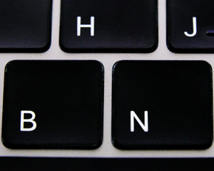 Closeup of the button of keyboard computer, soft focus, modern technology concept