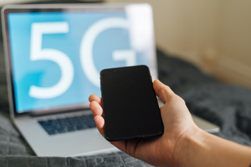 Hand with phone on the 5g background. Mockup for application.