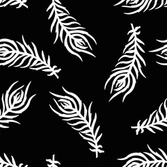 Obraz premium Seamless pattern of bird feathers. Vector illustration, on black background. 
