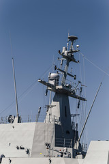 Main mast in a maritime action ship. Aerial and surface discovery radar. Navigation Radar, Fire...