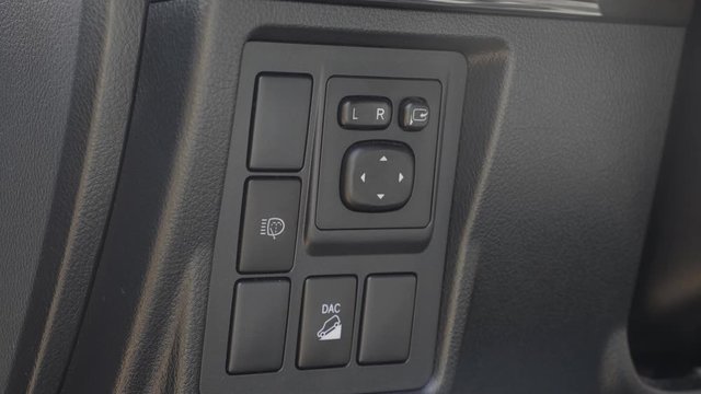Somebody presses the buttons of downhill assist control button.