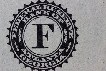 Closeup of front side of 1 dollar bill
