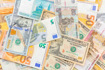 Cash money of various countries dollars, rubles, euro Top view