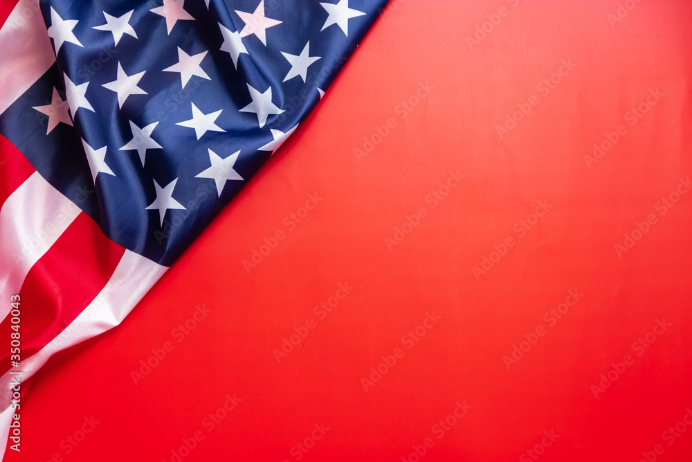 Wall mural vintage american flag isolated on red background with copy space for text. flag america background b