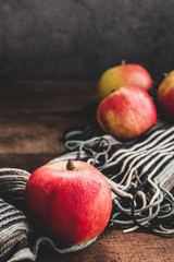 four apples are spread out on the table