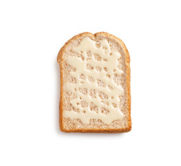 slice whole grain bread with sweetened condensed milk on white background