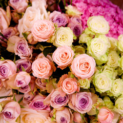 Fototapeta na wymiar wedding bouquet with rose bush as a background