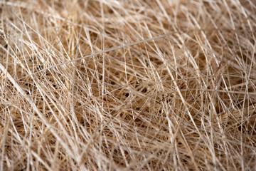 Natural texture of straw. Craft packaging. Coconut coir