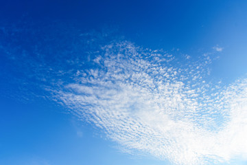 Blue sky with clouds tiny white for texture background.
