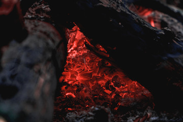 The abundance of red-hot coals of the night fire