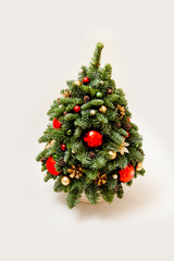 cristmas handmade tree made of fir decorated with balls