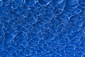  Blu water in swimming pool rippled water detail background