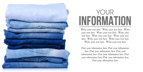 Stack folded blue shirt clothing and jeans on white background isolation, space for text