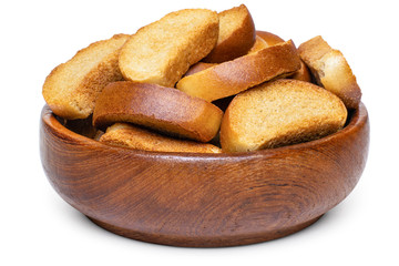 A heap of mini rusks in wooden bowl