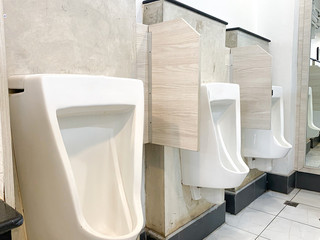 Men's white urinals design, Close up row of outdoor urinals men public toilet, Urinal concept.
