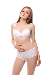 Fototapeta premium woman with a slim figure in white lingerie